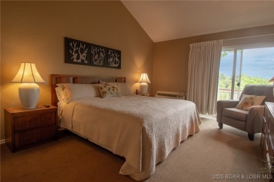 Welcome to your dream retreat in Tan Tar A Estates, an exclusive on The Oaks Golf Course in Missouri - for sale on GolfHomes.com, golf home, golf lot