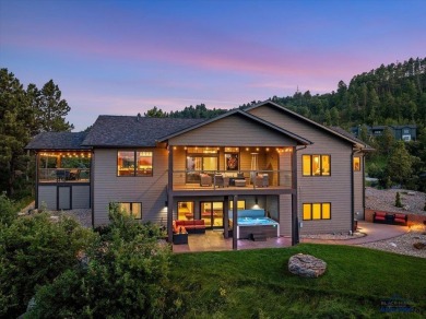 Tucked into nearly 3 acres of mature trees and peaceful hills on Spearfish Canyon Country Club in South Dakota - for sale on GolfHomes.com, golf home, golf lot