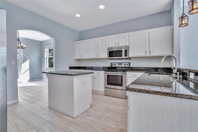 Stunning golf course frontage home in the highly desirable on Stoneybrook West in Florida - for sale on GolfHomes.com, golf home, golf lot