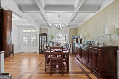 Experience panoramic views of the lake and golf course in this on Summergrove Golf Club in Georgia - for sale on GolfHomes.com, golf home, golf lot