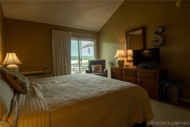 Welcome to your dream retreat in Tan Tar A Estates, an exclusive on The Oaks Golf Course in Missouri - for sale on GolfHomes.com, golf home, golf lot