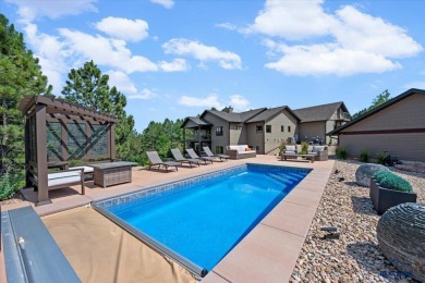 Tucked into nearly 3 acres of mature trees and peaceful hills on Spearfish Canyon Country Club in South Dakota - for sale on GolfHomes.com, golf home, golf lot