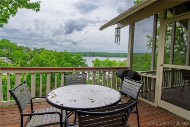 Welcome to your dream retreat in Tan Tar A Estates, an exclusive on The Oaks Golf Course in Missouri - for sale on GolfHomes.com, golf home, golf lot