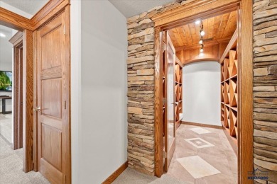 Tucked into nearly 3 acres of mature trees and peaceful hills on Spearfish Canyon Country Club in South Dakota - for sale on GolfHomes.com, golf home, golf lot