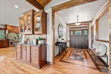 Tucked into nearly 3 acres of mature trees and peaceful hills on Spearfish Canyon Country Club in South Dakota - for sale on GolfHomes.com, golf home, golf lot