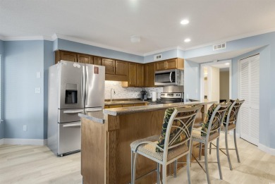 This 2 BR/2 BR 1st floor unit at Golf Glenn Villas is located on Beachwood Golf Club in South Carolina - for sale on GolfHomes.com, golf home, golf lot