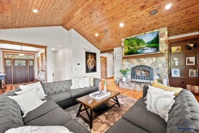 Tucked into nearly 3 acres of mature trees and peaceful hills on Spearfish Canyon Country Club in South Dakota - for sale on GolfHomes.com, golf home, golf lot
