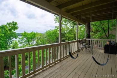 Welcome to your dream retreat in Tan Tar A Estates, an exclusive on The Oaks Golf Course in Missouri - for sale on GolfHomes.com, golf home, golf lot