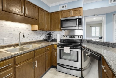 This 2 BR/2 BR 1st floor unit at Golf Glenn Villas is located on Beachwood Golf Club in South Carolina - for sale on GolfHomes.com, golf home, golf lot