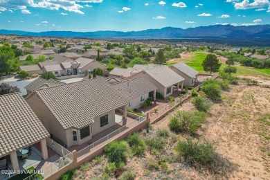 This gem of a home is located in the gated subdivision of Dorado on Verde Santa Fe Golf Club in Arizona - for sale on GolfHomes.com, golf home, golf lot