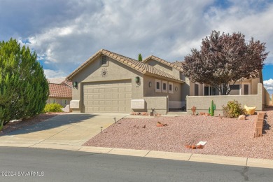 This gem of a home is located in the gated subdivision of Dorado on Verde Santa Fe Golf Club in Arizona - for sale on GolfHomes.com, golf home, golf lot