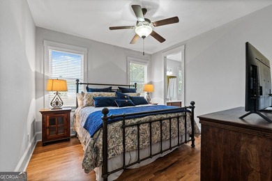 Experience panoramic views of the lake and golf course in this on Summergrove Golf Club in Georgia - for sale on GolfHomes.com, golf home, golf lot