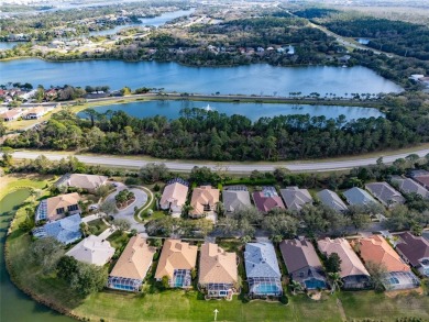 Step into your dream oasis at 99 Southlake Drive, Palm Coast on Grand Haven Golf Club in Florida - for sale on GolfHomes.com, golf home, golf lot