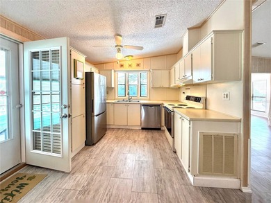 One or more photo(s) has been virtually staged. Wake up to the on Apollo Beach Golf and Sea Club in Florida - for sale on GolfHomes.com, golf home, golf lot