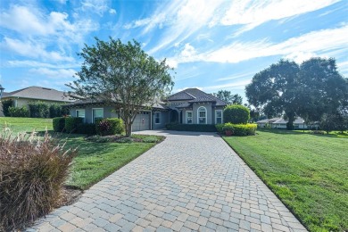 Welcome Home to your dream oasis in the guard-gated Golf Course on Harbor Hills Country Club in Florida - for sale on GolfHomes.com, golf home, golf lot