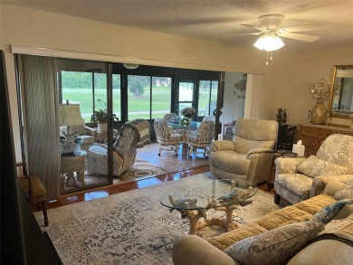 VILLA with TRANQUIL GOLF COURSE VIEWS IN EAST LAKE WOODLANDS on East Lake Woodlands Country Club in Florida - for sale on GolfHomes.com, golf home, golf lot