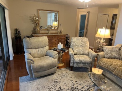 VILLA with TRANQUIL GOLF COURSE VIEWS IN EAST LAKE WOODLANDS on East Lake Woodlands Country Club in Florida - for sale on GolfHomes.com, golf home, golf lot