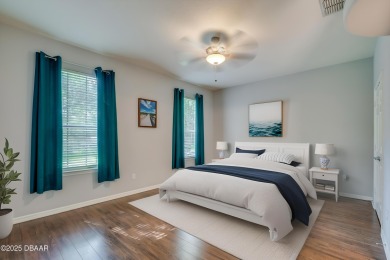 This beautifully maintained 2-bedroom, 2-bathroom single-level on LPGA International Golf Course in Florida - for sale on GolfHomes.com, golf home, golf lot