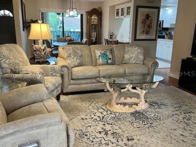 VILLA with TRANQUIL GOLF COURSE VIEWS IN EAST LAKE WOODLANDS on East Lake Woodlands Country Club in Florida - for sale on GolfHomes.com, golf home, golf lot