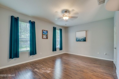 This beautifully maintained 2-bedroom, 2-bathroom single-level on LPGA International Golf Course in Florida - for sale on GolfHomes.com, golf home, golf lot