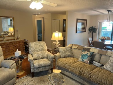 VILLA with TRANQUIL GOLF COURSE VIEWS IN EAST LAKE WOODLANDS on East Lake Woodlands Country Club in Florida - for sale on GolfHomes.com, golf home, golf lot