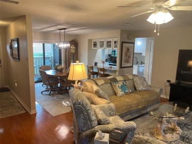 VILLA with TRANQUIL GOLF COURSE VIEWS IN EAST LAKE WOODLANDS on East Lake Woodlands Country Club in Florida - for sale on GolfHomes.com, golf home, golf lot
