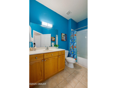 This beautifully maintained 2-bedroom, 2-bathroom single-level on LPGA International Golf Course in Florida - for sale on GolfHomes.com, golf home, golf lot