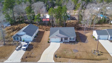 Welcome to Village Green, a newer home community in Shallotte on Brick Landing Plantation Yacht and Golf Club in North Carolina - for sale on GolfHomes.com, golf home, golf lot