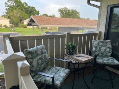 VILLA with TRANQUIL GOLF COURSE VIEWS IN EAST LAKE WOODLANDS on East Lake Woodlands Country Club in Florida - for sale on GolfHomes.com, golf home, golf lot