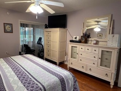 VILLA with TRANQUIL GOLF COURSE VIEWS IN EAST LAKE WOODLANDS on East Lake Woodlands Country Club in Florida - for sale on GolfHomes.com, golf home, golf lot