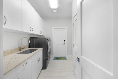 Nestled between the 9th green and 18th tee of the recently on Lost Lake Golf Club in Florida - for sale on GolfHomes.com, golf home, golf lot