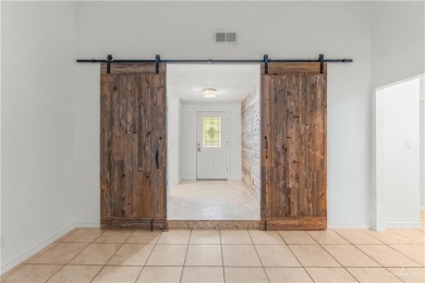 Spacious 3-bed, 3-bath home with two master suites--perfect for on Harlingen Country Club in Texas - for sale on GolfHomes.com, golf home, golf lot