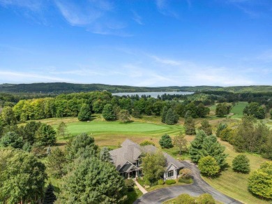 Discover this exceptional and stunning 5-bedroom, 4.5-bathroom on Boyne Mountain Resort - Monument Course in Michigan - for sale on GolfHomes.com, golf home, golf lot