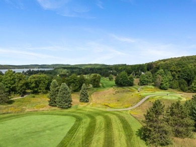 Discover this exceptional and stunning 5-bedroom, 4.5-bathroom on Boyne Mountain Resort - Monument Course in Michigan - for sale on GolfHomes.com, golf home, golf lot