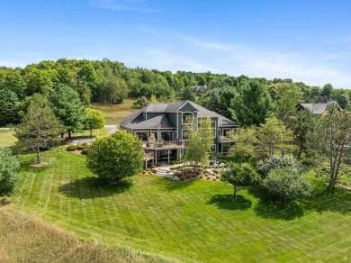 Discover this exceptional and stunning 5-bedroom, 4.5-bathroom on Boyne Mountain Resort - Monument Course in Michigan - for sale on GolfHomes.com, golf home, golf lot