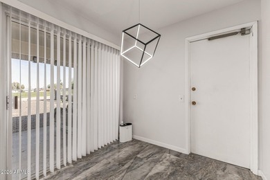 This beautifully updated Sun City home is perfectly situated on on Quail Run Golf Course in Arizona - for sale on GolfHomes.com, golf home, golf lot