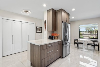 Contemporary penthouse in Eastgate at Hunters Run Country Club on  in Florida - for sale on GolfHomes.com, golf home, golf lot