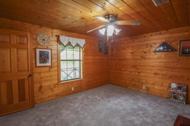 Nestled in the heart of the highly sought-after Holly Lake Ranch on Holly Lake Ranch Golf Club in Texas - for sale on GolfHomes.com, golf home, golf lot