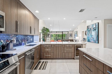 Contemporary penthouse in Eastgate at Hunters Run Country Club on  in Florida - for sale on GolfHomes.com, golf home, golf lot