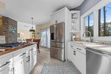 Immaculate golf-front home perfectly positioned on the 12th on Pinewild Country Club of Pinehurst in North Carolina - for sale on GolfHomes.com, golf home, golf lot