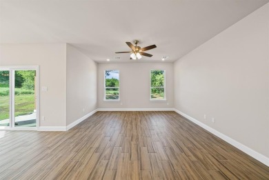 A MUST SEE... PRICED TO SELL!! Beautiful new construction with 3 on The Club At Runaway Bay in Texas - for sale on GolfHomes.com, golf home, golf lot
