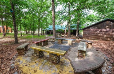Nestled in the heart of the highly sought-after Holly Lake Ranch on Holly Lake Ranch Golf Club in Texas - for sale on GolfHomes.com, golf home, golf lot