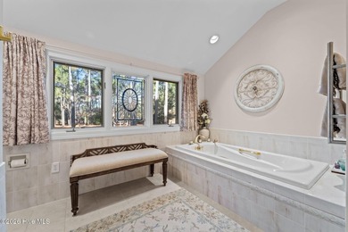 Immaculate golf-front home perfectly positioned on the 12th on Pinewild Country Club of Pinehurst in North Carolina - for sale on GolfHomes.com, golf home, golf lot