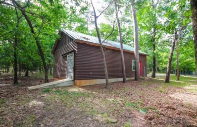 Nestled in the heart of the highly sought-after Holly Lake Ranch on Holly Lake Ranch Golf Club in Texas - for sale on GolfHomes.com, golf home, golf lot