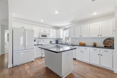 Welcome to this beautifully maintained two-bedroom, two-bathroom on The Golf Club of Cypress Creek in Florida - for sale on GolfHomes.com, golf home, golf lot