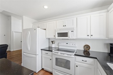 Welcome to this beautifully maintained two-bedroom, two-bathroom on The Golf Club of Cypress Creek in Florida - for sale on GolfHomes.com, golf home, golf lot