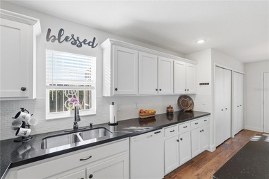 Welcome to this beautifully maintained two-bedroom, two-bathroom on The Golf Club of Cypress Creek in Florida - for sale on GolfHomes.com, golf home, golf lot