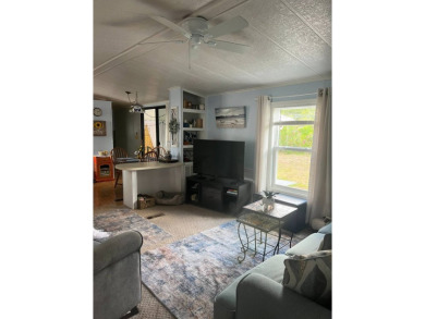 PRICE DROP! Welcome to this charming well maintained and on Lake Henry Golf Club in Florida - for sale on GolfHomes.com, golf home, golf lot
