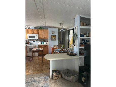 PRICE DROP! Welcome to this charming well maintained and on Lake Henry Golf Club in Florida - for sale on GolfHomes.com, golf home, golf lot