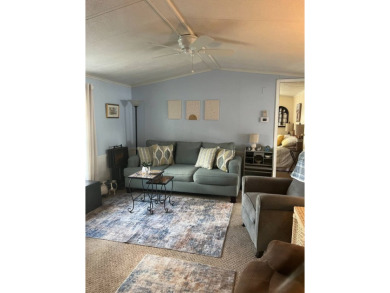 PRICE DROP! Welcome to this charming well maintained and on Lake Henry Golf Club in Florida - for sale on GolfHomes.com, golf home, golf lot
